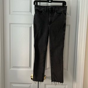 Madewell black stovepipe ankle jeans.  Unfinished hem.  Stretchy